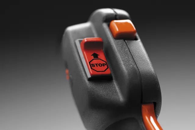 Auto return stop switch